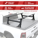 Heavy-duty aluminum truck bed rack on a white truck with features highlighted.