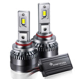 Two car  9005 headlight bulbs with a control unit on a white background, featuring the Syneticusa brand.