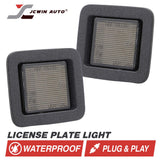 Two license plate lights with JCWin Auto branding on a white background