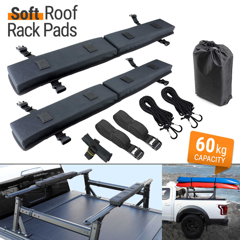 Soft roof rack pads set shown on a white background with a bottom-left inset demonstrating installation on a truck bed and a bottom-right inset showing the pads in use on a pickup truck carrying a kayak. The set includes two long black padded rack pads, straps, ropes, buckles, and a black drawstring storage bag.