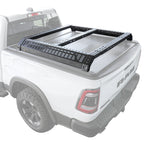White Ram truck with a black roof rack on a white background