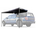 Black truck bed cover on a blue pickup truck with a white background