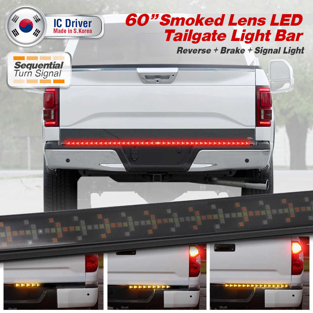 A 60-inch smoked lens LED tailgate light bar shown installed on the rear bumper of a white pickup truck, with text indicating sequential turn signal lighting and three inset close-ups of the light bars glowing in different positions.