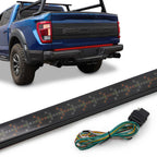 A black vehicle LED light bar with a wiring harness is shown alongside a blue Ford pickup truck, demonstrating its installation on a vehicle.