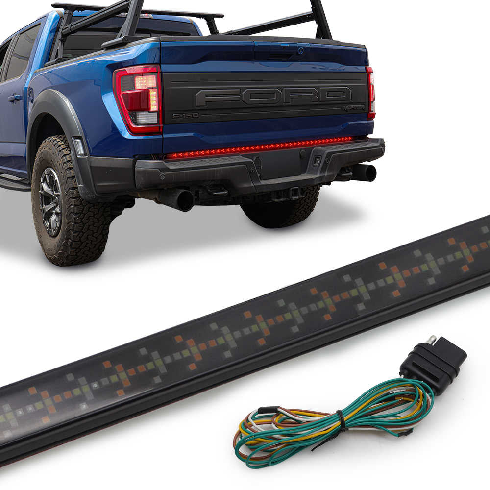 A black vehicle LED light bar with a wiring harness is shown alongside a blue Ford pickup truck, demonstrating its installation on a vehicle.