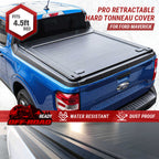 Blue Ford Maverick truck with a pro retractable hard tonneau cover on a white background