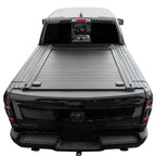 Black truck with a tonneau cover on a white background