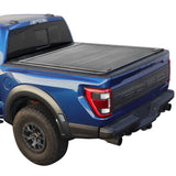 blue raptor installed mb retractable tonneau cover with white background