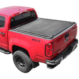 emb retractable tonneau cover installed on red Chevy Colorado 5ft bed