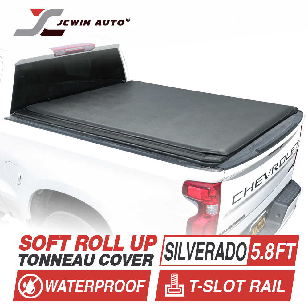 Chevrolet Silverado truck bed with a soft roll up tonneau cover, featuring JCWin Auto branding.