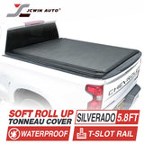Chevrolet Silverado truck bed with a soft roll up tonneau cover, featuring JCWin Auto branding.