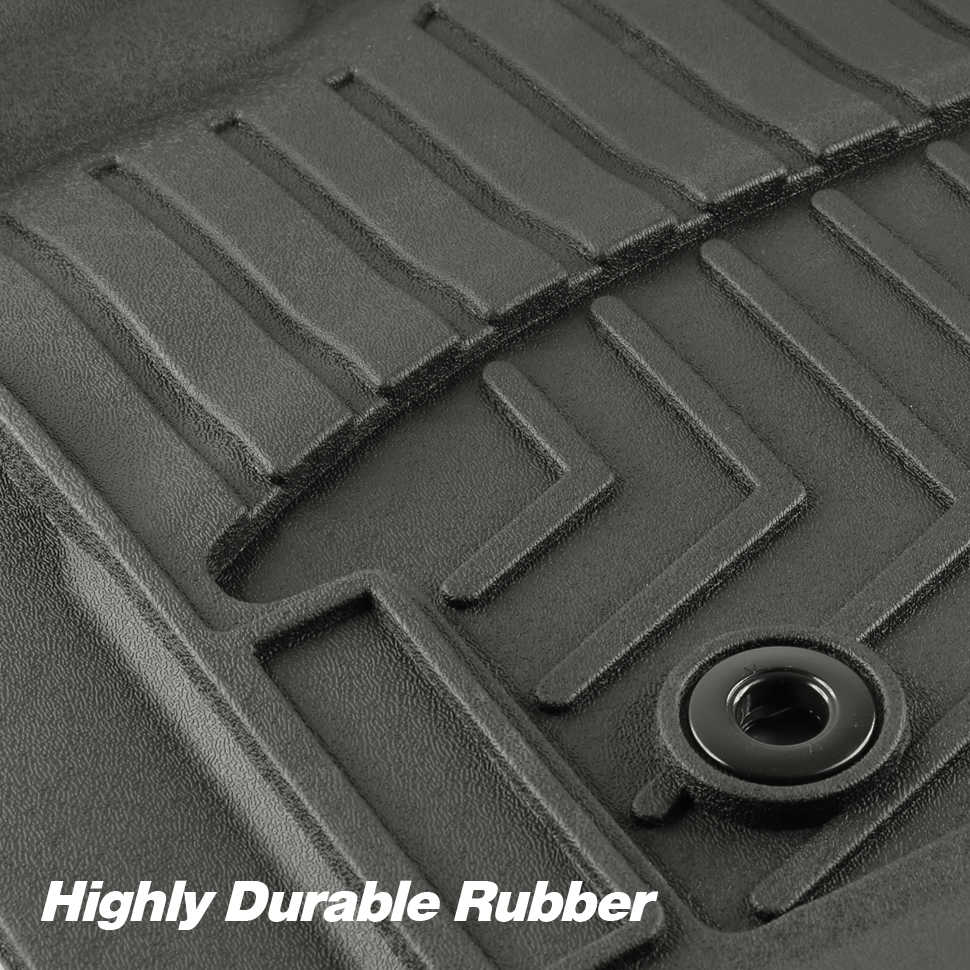 A close-up of a dark gray molded rubber car floor mat with textured ridges and a circular grommet, with the text 'Highly Durable Rubber' overlaid at the bottom.
