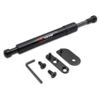 A black hydraulic door stopper extension kit with a gas strut rod, two mounting brackets, two mounting bolts, and an Allen wrench, displayed on a clean white background. The strut features a red and white 'JCWIN' logo.