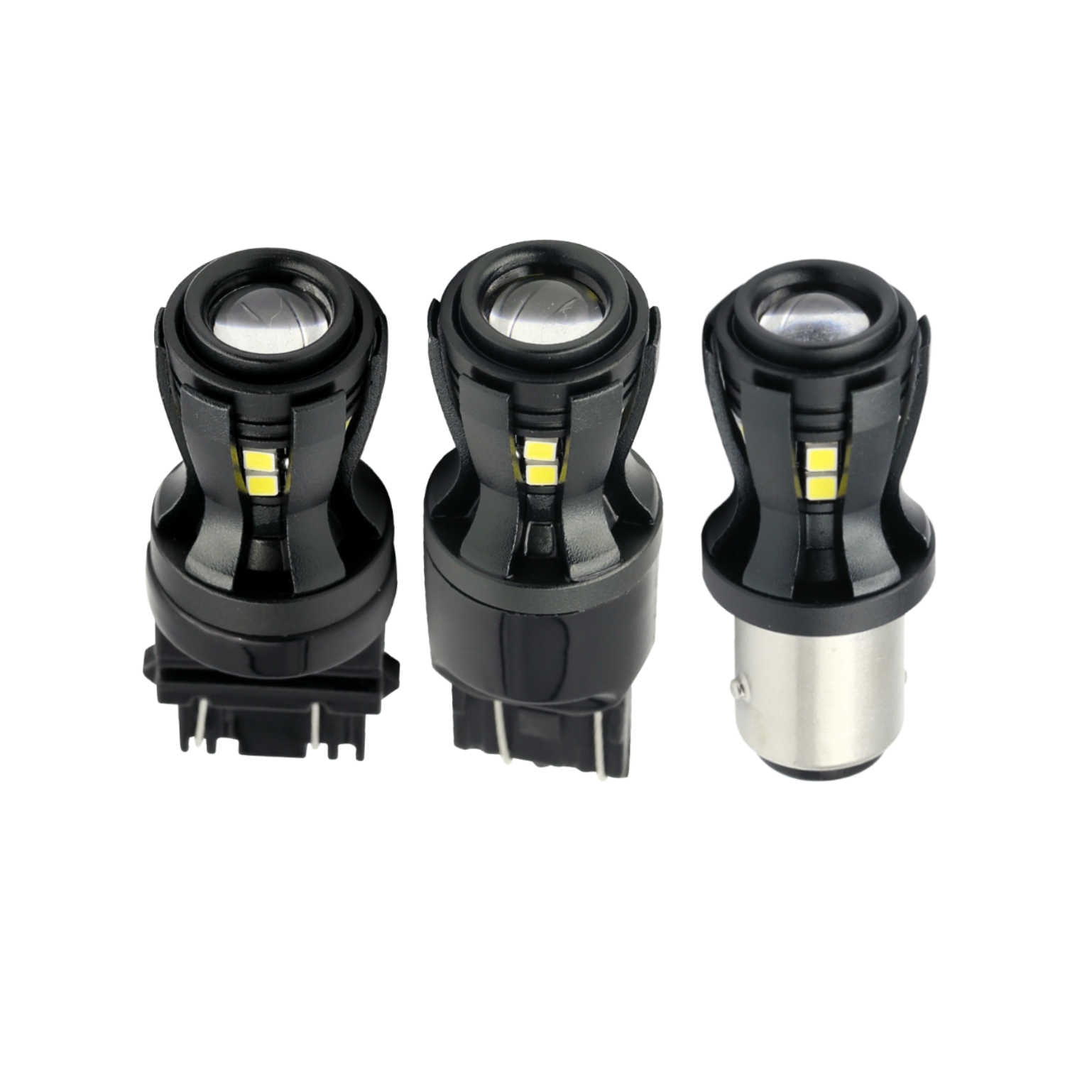 Three black automotive light bulbs on a white background