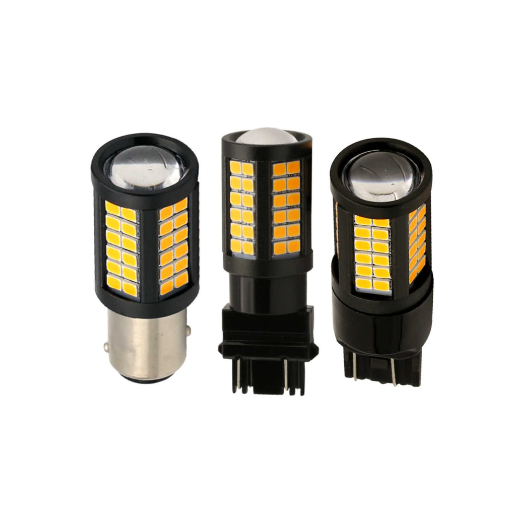 Three black LED car light bulbs with yellow-orange illuminated LED strips, shown on a plain white background.