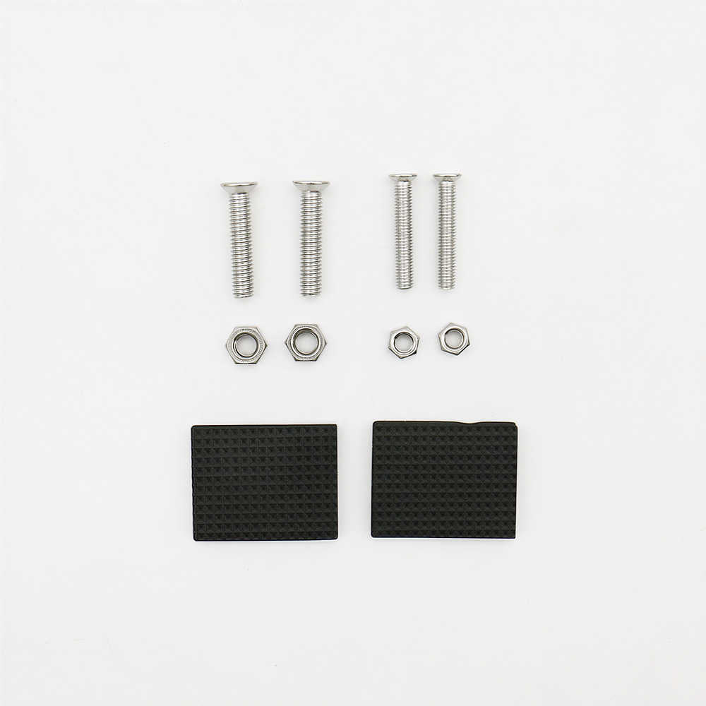 A hardware accessory kit containing four silver metal screws, four hex nuts, and two textured black rectangular pads, arranged neatly on a clean white background.
