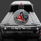 Truck bed cover with key lock system on a dark background