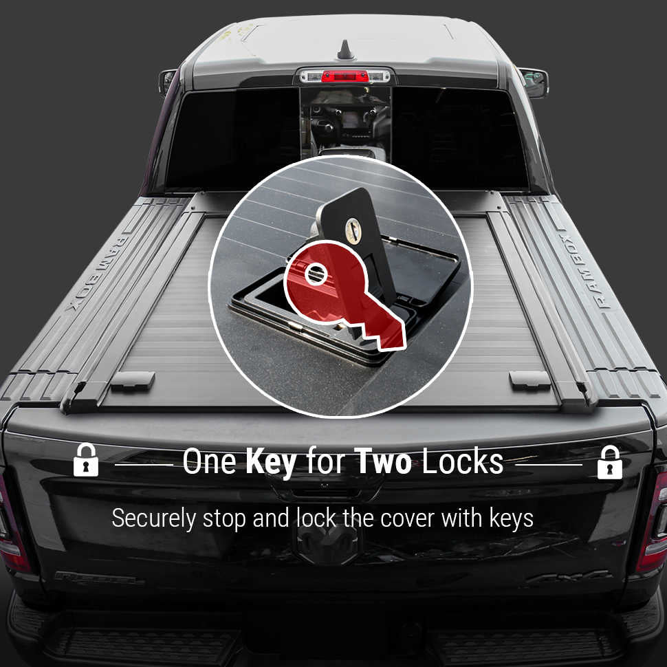 Truck bed cover with key lock system on a dark background