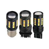 Three LED car bulbs on a white background
