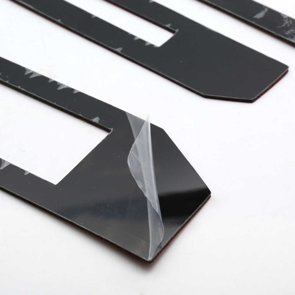 Black automotive trim strips with adhesive backing for truck styling and protection