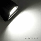 A close-up of a black LED light fixture casting a bright white beam of light onto a dark surface, with the text 'WHITE LED LIGHT' in the bottom right corner.