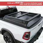 Black truck bed rack on a white truck with text about weight capacity.