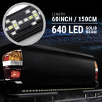 A black LED truck bed light bar shown mounted along the rear bumper of a black pickup truck, with a circular inset showing the internal LED strip and text reading 60INCH / 150CM and 640 LED SOLID BEAM.