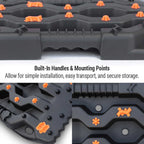 Black truck bed mat with orange accents, built-in handles, and mounting points for easy install and storage.