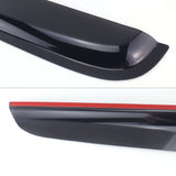 Black car spoiler with red accent on a white background