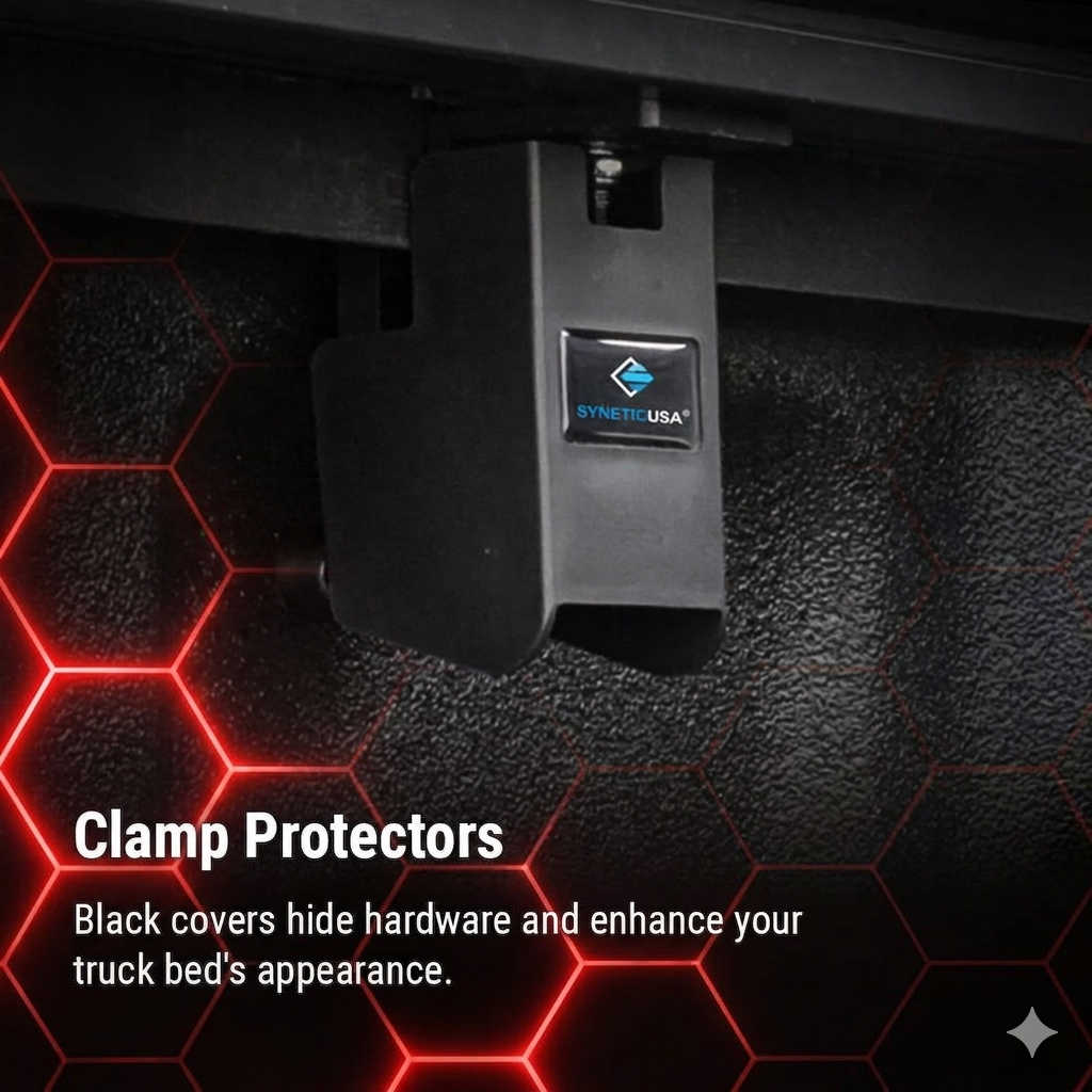 Black clamp protector with Synetic USA logo on a textured black surface with red geometric patterns.