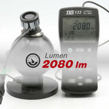 Luminous flux meter with digital display and light source on a white background