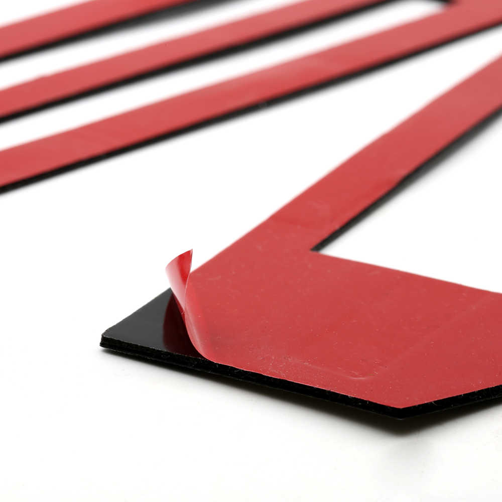 Red adhesive automotive trim strips for truck fender flares or grille accents
