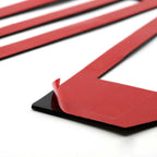 Red adhesive automotive trim strips for truck fender flares or grille accents