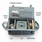 An open gray camping kitchen organizer bag shown on a white background with labeled callouts for foldable utensils, cutting board, power cord, cup, pot, and skillet bowl.