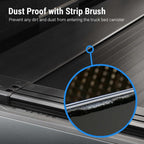 Close-up of a black truck bed cover with text reading 'Dust Proof with Strip Brush' and a blue circular inset highlighting the brush edge along the seal.