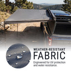 Weather-resistant fabric cover on a truck bed with mountainous background