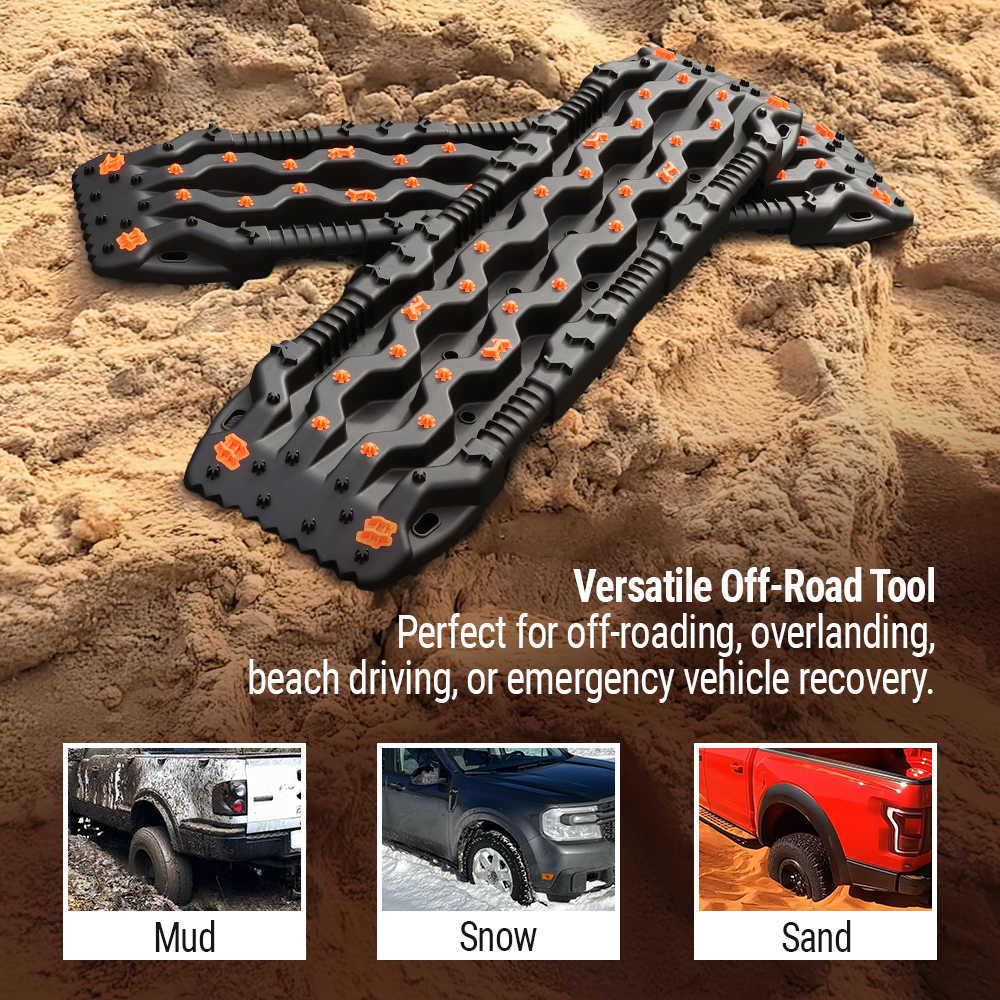 Black off-road recovery boards with orange grips for mud, snow, sand traction