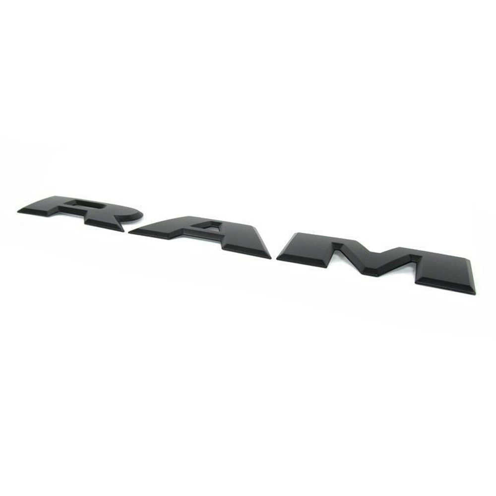 Black RAM letter emblem for truck front grille, compatible with Ram 1500, durable automotive accessory