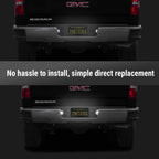 A product comparison showing a pair of bright white LED light bars mounted on the bumper of a black GMC Sierra truck. The top image shows the truck with no lights illuminated, and the bottom image shows the same truck with the white light bars turned on, casting a bright glow.