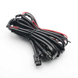 Black electrical wire cable with connectors on a white background