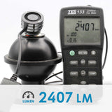 Luminous flux meter with digital display showing 2407 Lumen on a white background