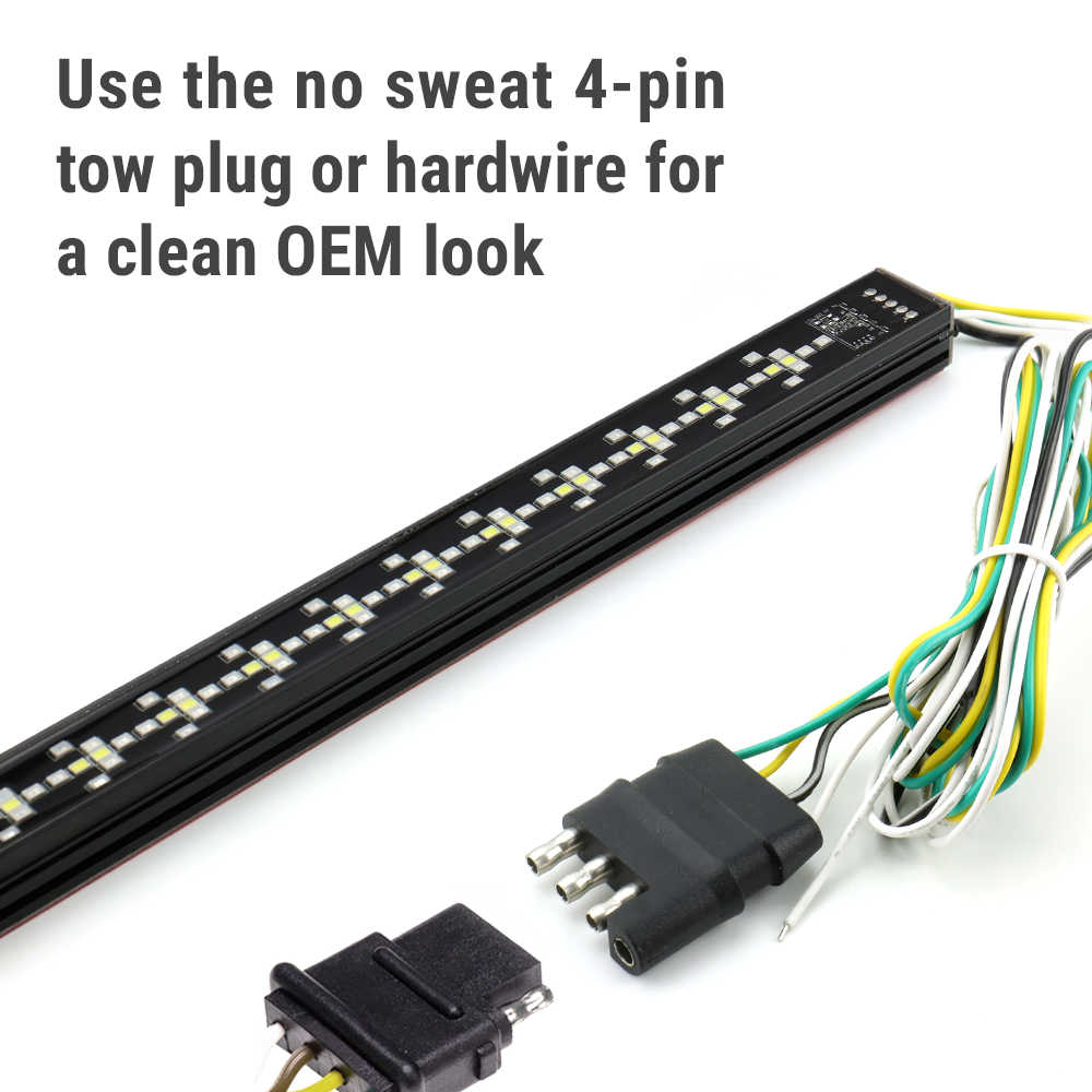 A black LED light bar with multicolored wiring shown on a white background, accompanied by text that reads 'Use the no sweat 4-pin tow plug or hardware for a clean OEM look' and two close-up views of connector plugs.