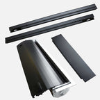 Set of black metal components on a white background
