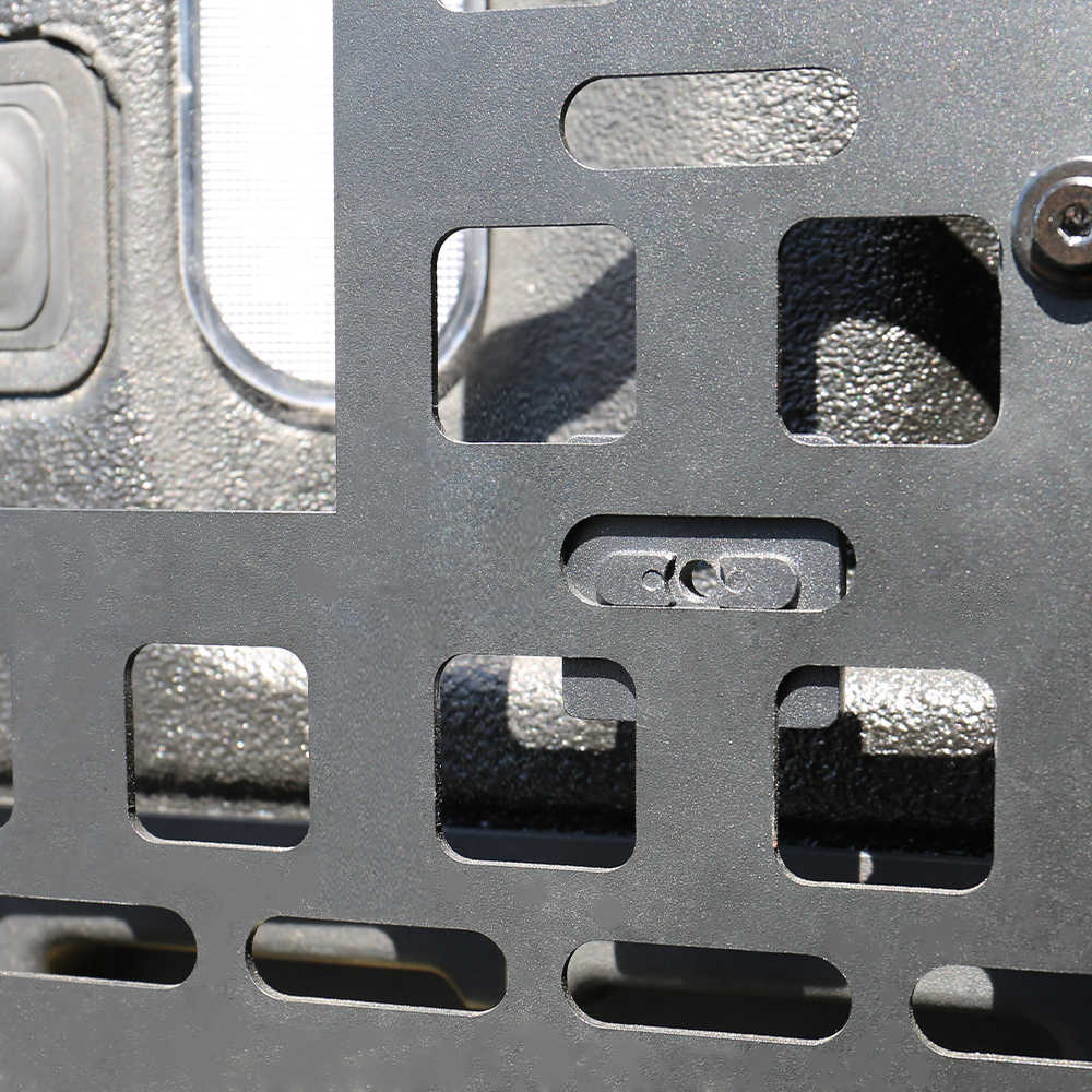 Close-up of a metallic grid with square holes