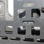Close-up of a metallic grid with square holes