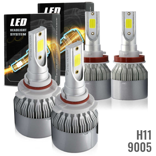 Set of LED headlight bulbs with packaging on a white background