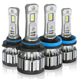 Set of four LED car light bulbs on a white background