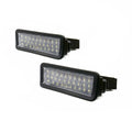 A pair of black rectangular LED license plate lights with clear ribbed lenses, shown on a plain white background.