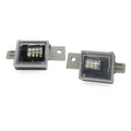 Two rectangular LED license plate lights with gray metal mounting brackets, shown on a plain white background.