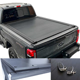 Gray Ford truck with a tonneau cover and remote controls on a white background